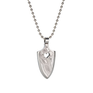 Medium Yanone pendant with pierced heart, 39mm x 20mm x 4mm